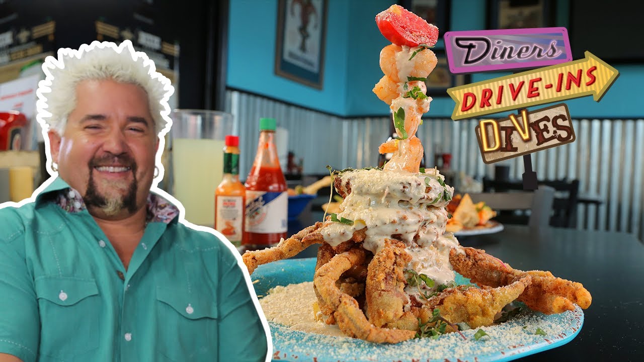 Guy Fieri Eats a Huge Seafood TOTEM POLE | Diners, Drive-ins and Dives with Guy Fieri | Food Network