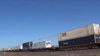 UP 4128  Stack train is going Westbound through McClellan the train meet is at in CA