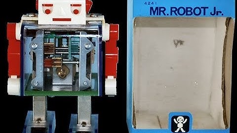 Vintage robots with Linear shuffle walking action. Robot Hut.