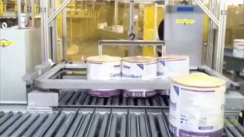 Banding Rolls of Insulation with the H2BI Indexing Arch Fully Automatic Plastic Banding Machine