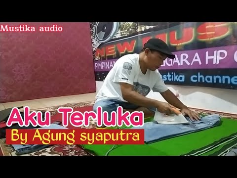 AKU TERLUKA BY AGUNG SYAPUTRA