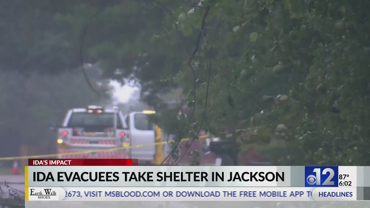 neighbors wait in long lines to get gas after Hurricane Ida