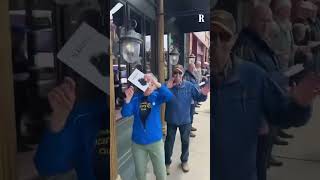 A human chain in Michigan helps a bookstore move.