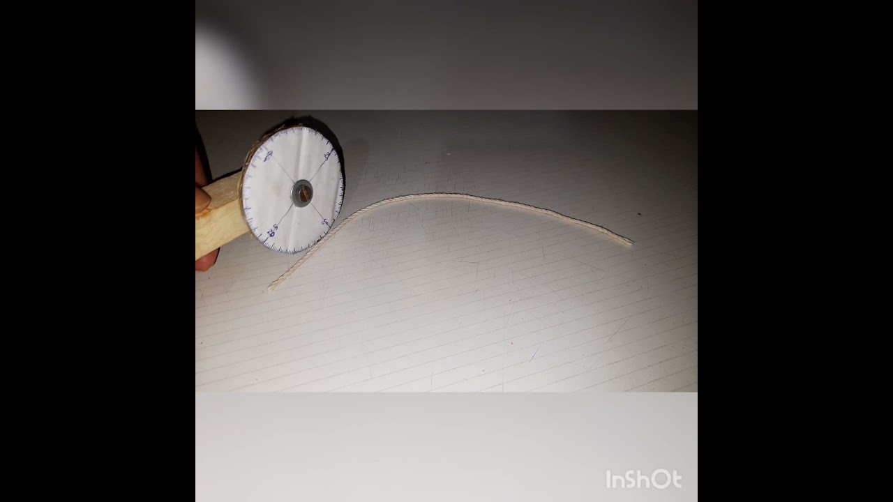 Instrumento de medición casero. Magnitud: Longitud