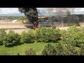 RAW: Bystander films man jumping from fuel tanker as it explodes into flames