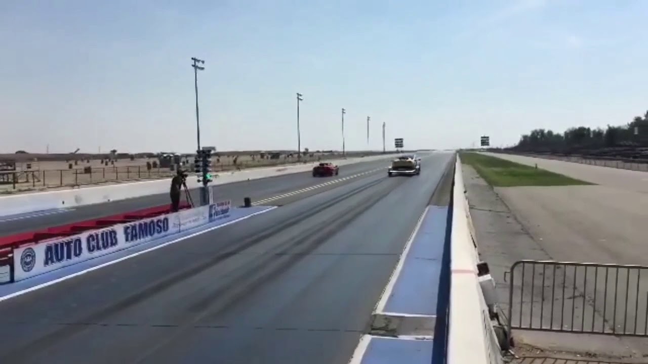 Tesla Model X Drag Races While Pulling Trailer