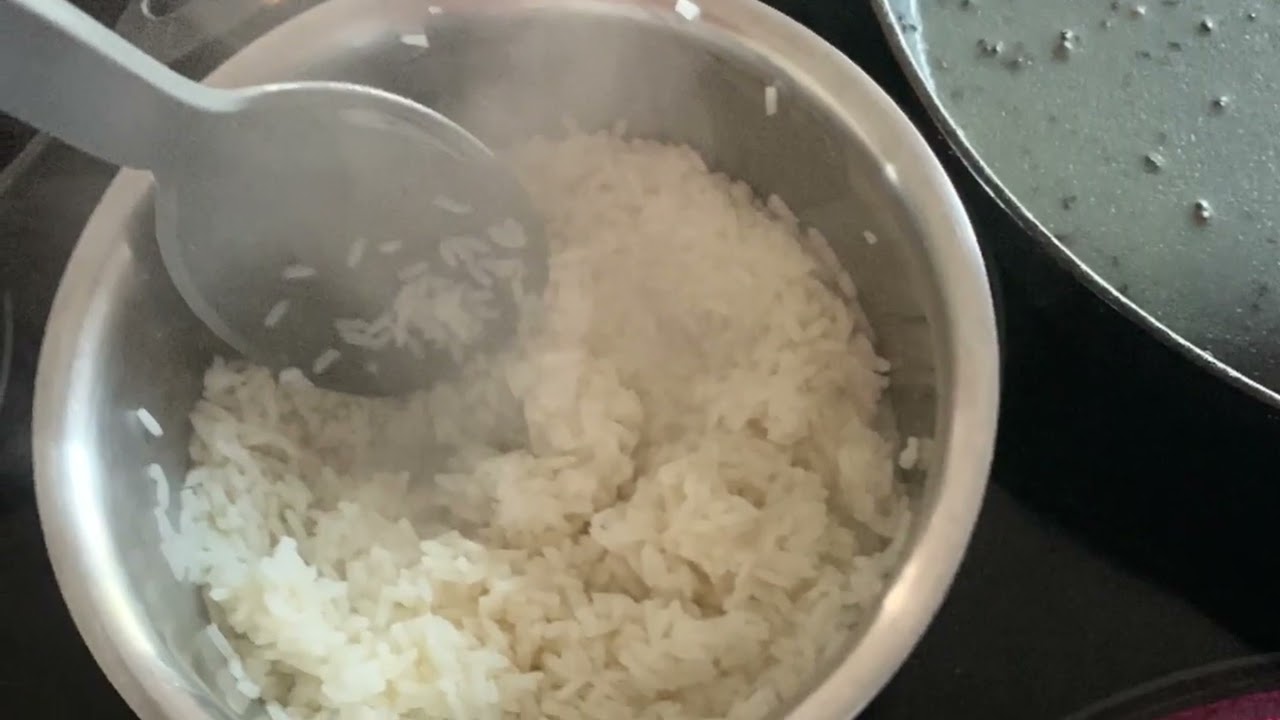making chicken and rice with a handsome man