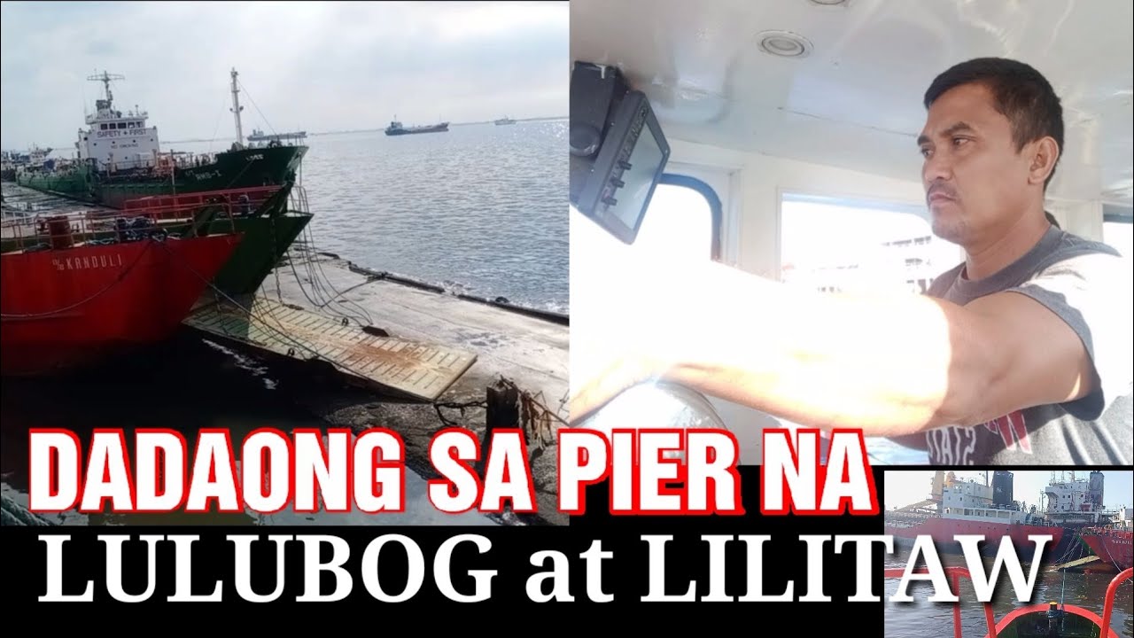 TUG AND BARGE DOCKING IN SINKING PIER,INTERISLAND LIFE PHILIPPINES OF JOEMARINO MUSCLE