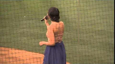 Lauretta Williams sings the National Anthem at a L...