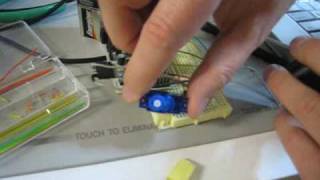 Tmobile G1 Robot Using Qik, Arduino, And Python On Android Communicating Through The Serial Port