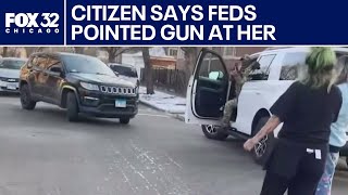 U.S. citizen claims federal agent pointed gun at her