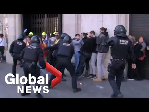 Violent clashes between Catalan riot police and pro-independence protesters in Barcelona