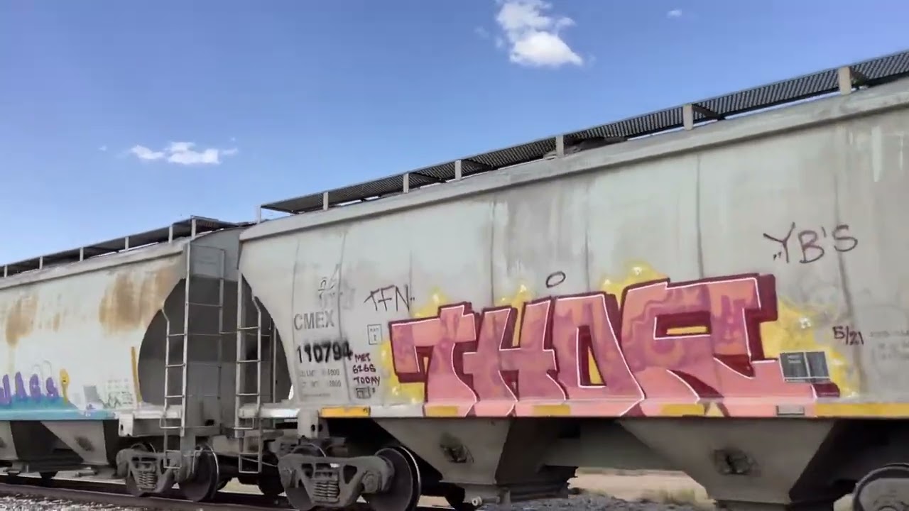 Outbound train goes by E Milligan Rd