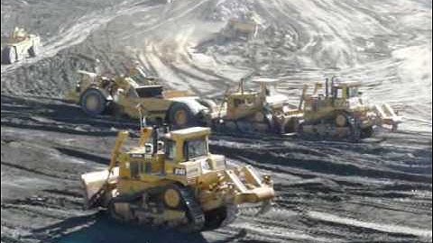 CAT 651B scrapers & D10