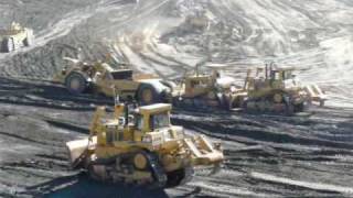 CAT 651B scrapers & D10's