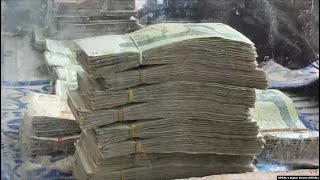 Afghans Defy Taliban Ban On Using Foreign Currencies