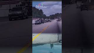 Watch as a U.S. police chase sends a fleeing U-Haul flying