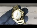 RELÓGIO GUESS CAIXA EM AÇO INOXIDÁVEL COM ACABAMENTO DOURADO
