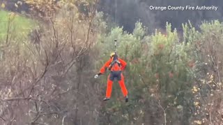 DRAMATIC RESCUE: Woman pulled from creek as at least 19 dead from California storms