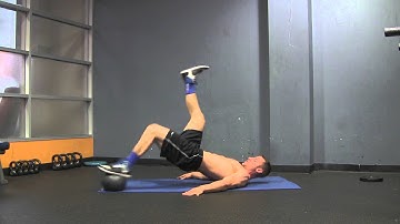 Medicine Ball Single Leg Hamstring Curls | Tim McComsey