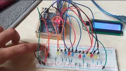 Menyalakan 12 LED, LCD dengan modul i2c menggunakan 1 push button di Arduino Uno