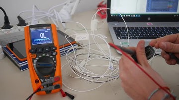 Clamp meter HT9022 and TRMS multimeter HT64 in use from university students