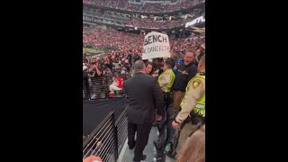 Raiders fan kicked out because he had a Bench the Head Coach sign at the football game