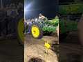 1938 John Deere G pulling a walk on sled