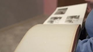 Grandma Looks At Album Stock Video