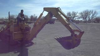 John Deere 450 Crawler - Auctioneers Miller & Associates