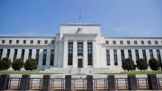 Fed raises rates