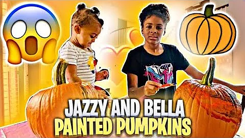 Jazzy and Baby Bella painting Pumpkins . A great s...