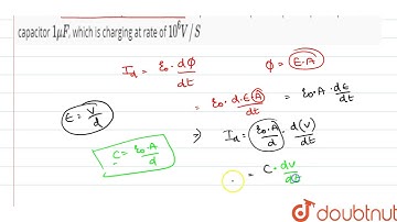 What is the instantaneous displacement current in space between plates of parallel plate