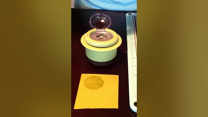 April Foster demos the Epiphany Crafts button maker