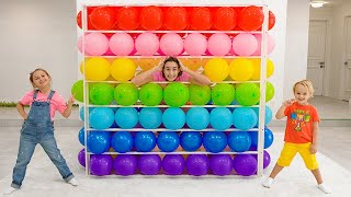 chris and mom balloons cube challenge