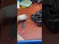Real footage of the production process for cutting safety shoes with injection-molded soles.