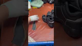 Real footage of the production process for cutting safety shoes with injection-molded soles.