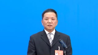 CPPCC Members' Corridor: Reunification is the trend of history