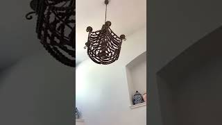 Changing the lightbulbs on my hard to reach chandelier