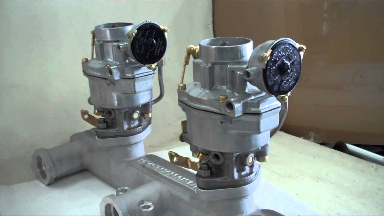 Dual Rochester carburetors with auto choke on a Offenhauser manifold