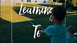 Teaching my four year old to cast a fishing pole