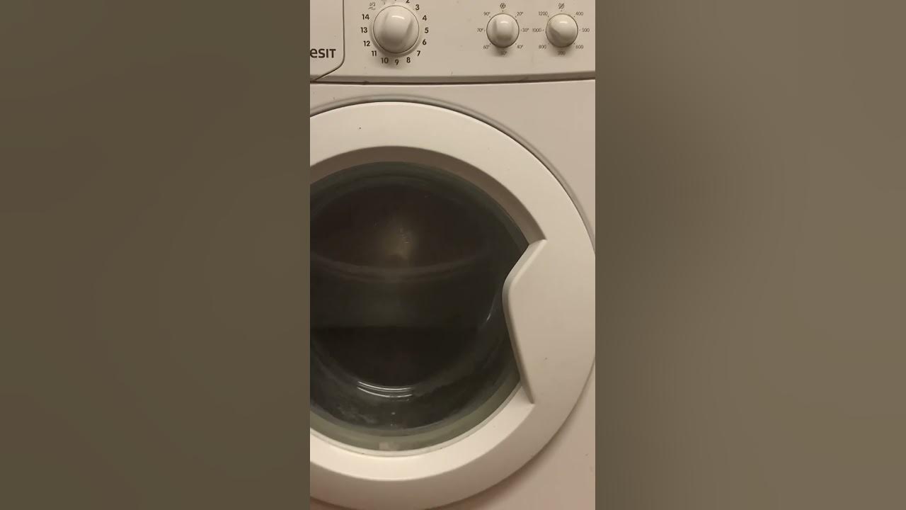 INDESIT 71252 eco water saving washing machine on its spin cycle YouTube