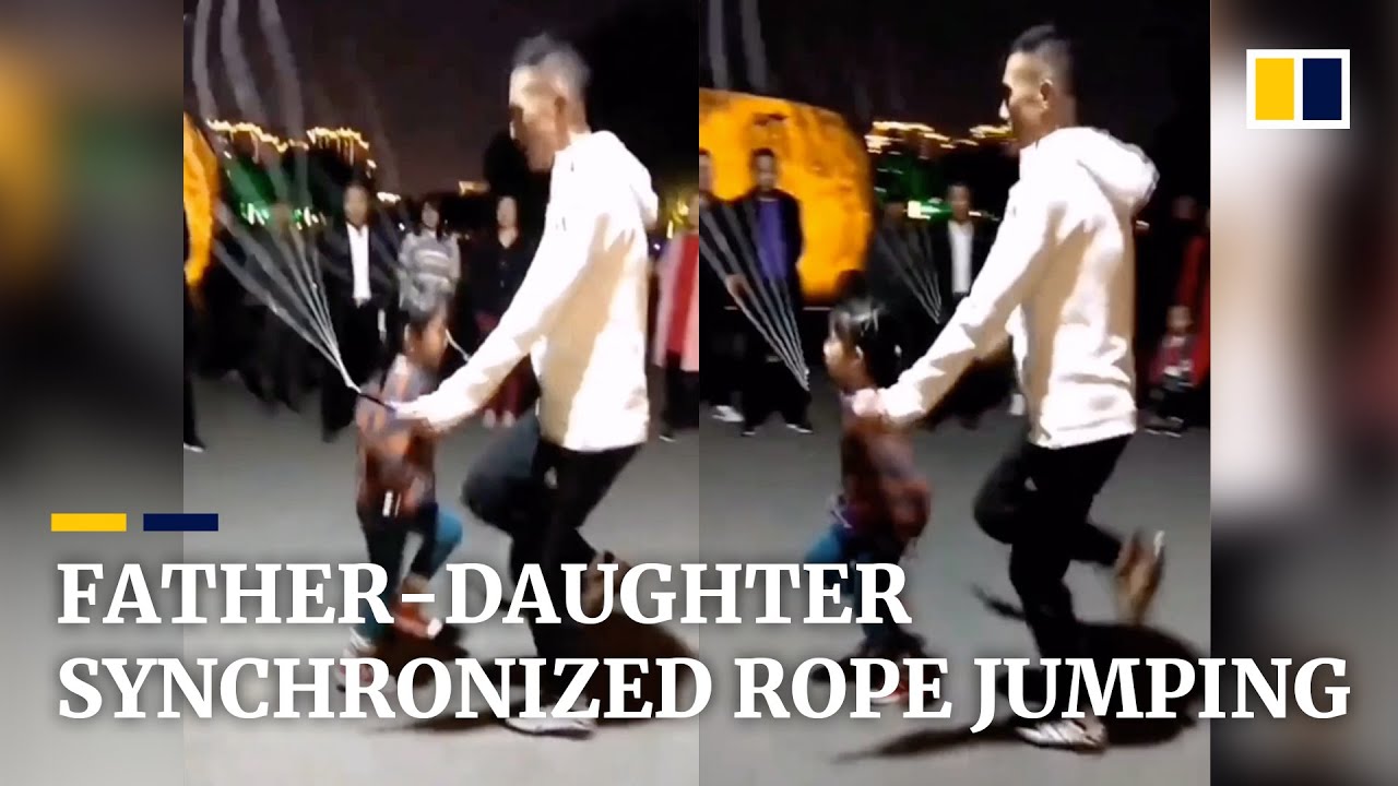 Father jumps rope in sync with daughter in China - YouTube