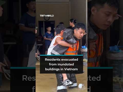 Emergency crews evacuate residents as Typhoon Narra floods northern Vietnam
