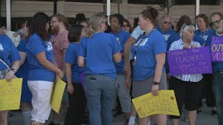 Akron Education Association holds rally ahead of board's vote on $24 million budget cut