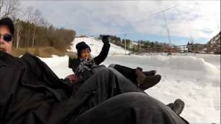 Tim and Charina Winter tubing.wmv