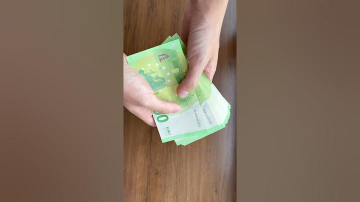Counting big stack of cash Euro €
