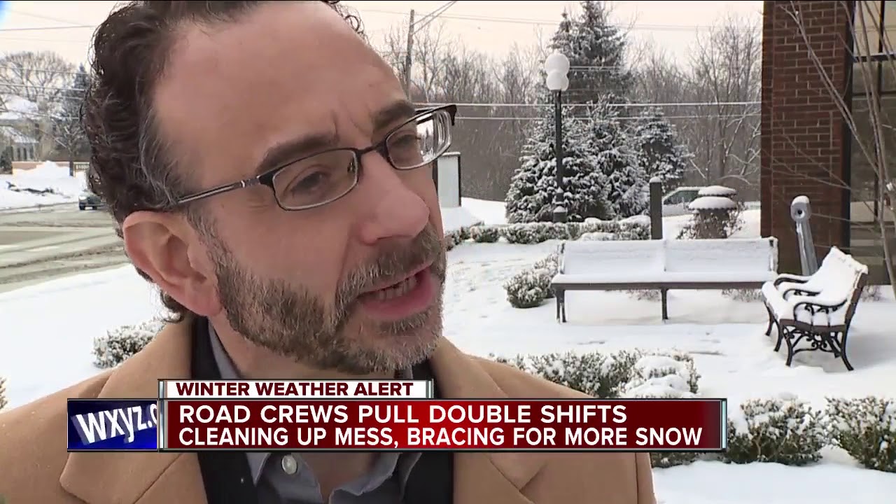 Crews cleaning roads after snow storm - YouTube