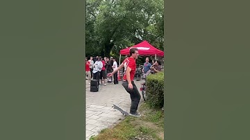 Skater executes a perfect 360 flip and jumps into the bushes!