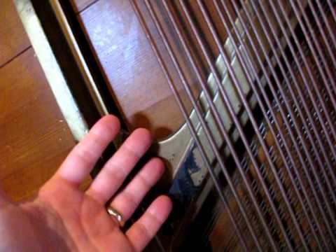 Frequency Aliasing with a Strobe Light on Piano Base String.